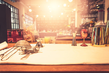 Background of cocktails mixing workshop preparation on counter bar. Professional bartender club preparing fresh delicious tasty cocktail alcohol liquor drink using beverage shaker on vintage concept