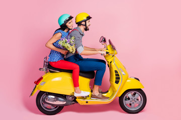 Full length profile side photo of positive cheerful bikers driver rider two people drive motor bike...