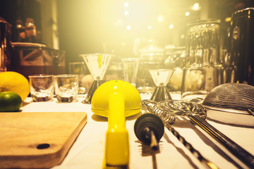 Background of cocktails mixing workshop preparation on counter bar. Professional bartender club preparing fresh delicious tasty cocktail alcohol liquor drink using beverage shaker on vintage concept