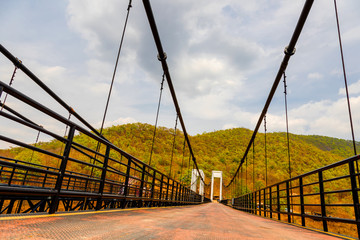 CHIANGMAI, THAILAND - April 26, 2020 : Suspension bridge at Mae Kuang Udom Thara dam, Thailand.