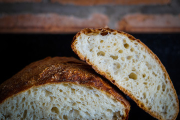 Homemade bread on a dark surface