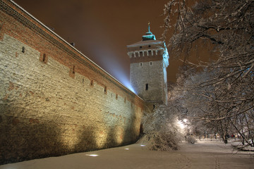 City medieval gothic walls in Old Town of Cracow, Poland