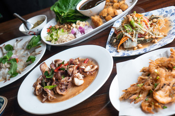 Background delicious tasty authentic real exotic Thai seafood meal set for lunch and dinner food. Healthy organic homemade fresh seafood true local menu natural ingredient from local fisherman market