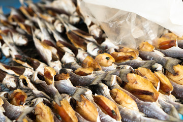 Local fisherman market dry traditional homemade delicious salted fish free from insecticide and preservation. the fish is organic and made in authentic ancient way but with fly unclean hygiene issue.