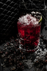 Сocktail on a black decor background
