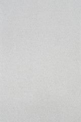 Close-up detail gray color background from sheet of recycled carton. Close-up detail macro view of abstract texture recycled ecofriendly cardboard material pattern background.