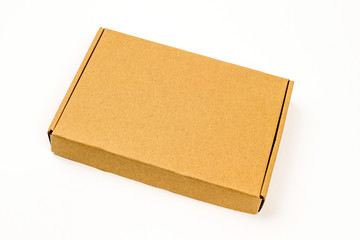 One closed rectangular cardboard box isolated on white background
