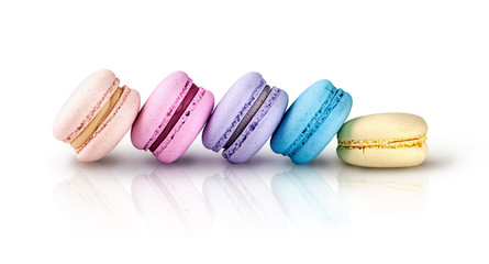 Five multicolored macaroons ladder in row