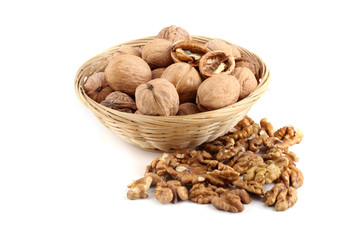 Walnuts on wicker plate