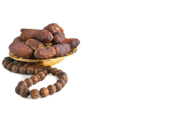 Date fruits or dry dates isolated on white background.Ramadan Kareem Breaking the fast by eating Tamar Dates