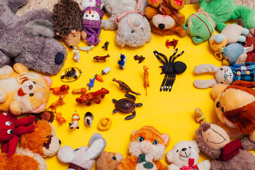 children's soft toys for developing games on a yellow background