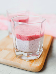 Chia pudding with mashed berries and banana, Healthy eating concept. Super food.