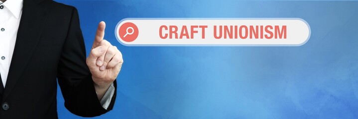 Craft Unionism. Lawyer in suit points with his finger to a search box. The term Craft Unionism is...