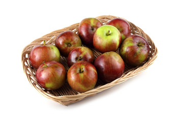 Apples on wicker dish