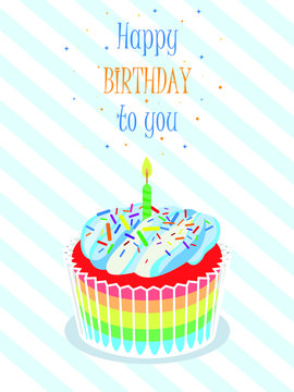 Cupcake with greeting card. Text HAPPY BIRTHDAY TO YOU on card.