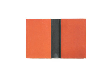 Open hard cover red book on white background