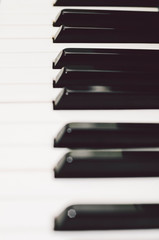 Piano keys close up. Vertical photo.