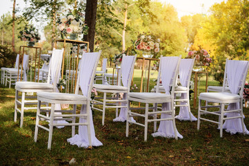 Close up white vintage chairs decorated