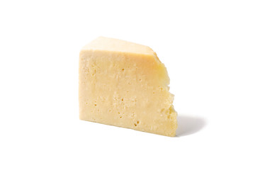 A piece of goat cheese isolated on white