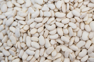 Great Northern Beans background. Also called white kidney beans, these beans have a smooth texture, and delicate flavor