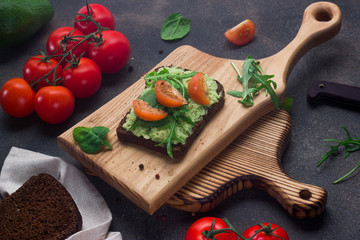 Avocado toast on whole grain sandwich bread. Healthy eating, dieting, vegan vegetarian food