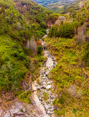 Aerial photograph of a stream in the deep mountain