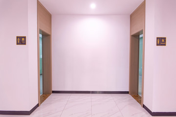 Men's and women's toilet door