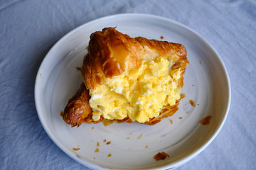 croissant with scrambled eggs