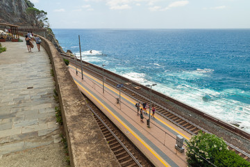 Fototapeta na wymiar Railway along the coast leading to Vernazza village. Cinque Terre, Italy