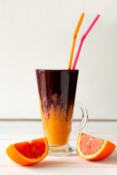 Detox citrus, banana and blueberry smoothie. Healthy food or vegetarian concept. Selective focus