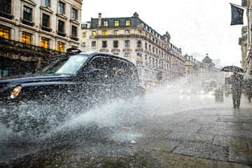 Wet London street scene on Regent Street in the West End