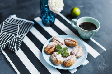 Madeleine cookies with nuts and icing sugar - 344559070