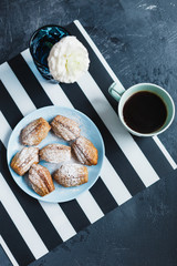 Madeleine cookies with nuts and icing sugar - 344559453