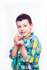 little cute real boy on white background gesture smiling close up, lifestyle people concept