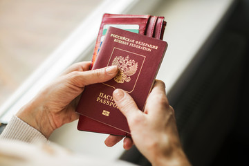 foreign passport of the Russian Federation is held by female hands