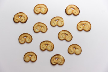 Palmier cookies on white background,palmeras traditional dessert, soft light
