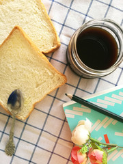 cup of coffee and bread on the afternoon summer free time