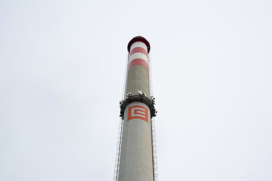 OSTRAVA, CZECH REPUBLIC - MARCH 3, 2017: Smokestack / Chimney of power station with logo of CEZ Group - Czech public company that produces, distributes and sells electricity, electric energy and heat.