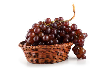 Black grape on wicked plate