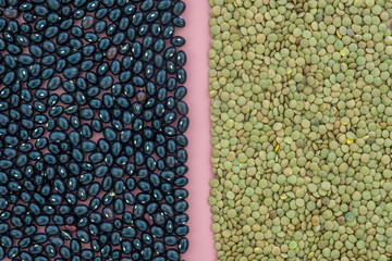 Beans and lentils on a pink background