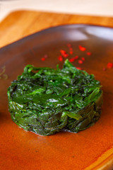 restaurant dish on a plate and ingredients that it includes