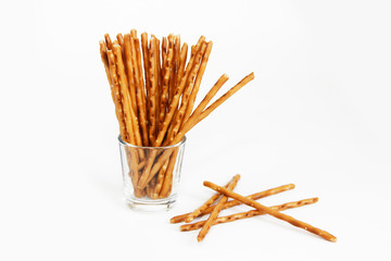 edible snack dry sticks with salt on a white background