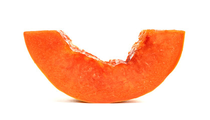 Ripe papaya slice isolated on white background