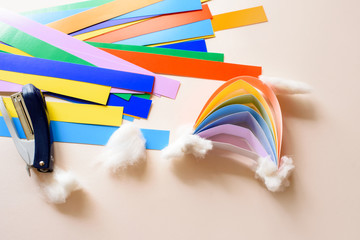 Step-by-step instruction to create a rainbow of colored paper. Creativity with your own hands.