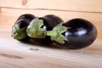 Aubergines on table
