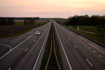 Road for cars in the evening at sunset