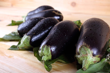 Aubergines on table