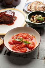 delicious tomato soup and basil on