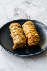 Homemade Baklava with Walnut and Hazelnuts /Organic Rolled Burma Baklawa with Sugar Beet.