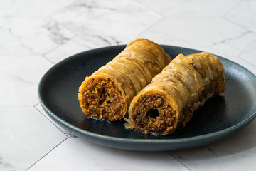 Homemade Baklava with Walnut and Hazelnuts /Organic Rolled Burma Baklawa with Sugar Beet.